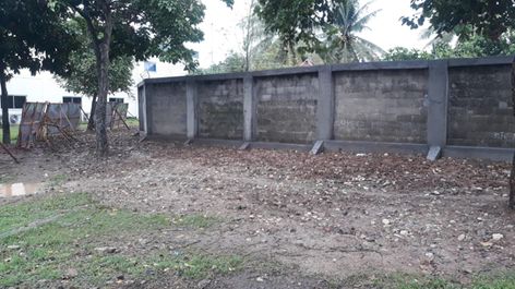 Pagar tembok PT. EDS Manufacturing Indonesia setelah diperbaiki